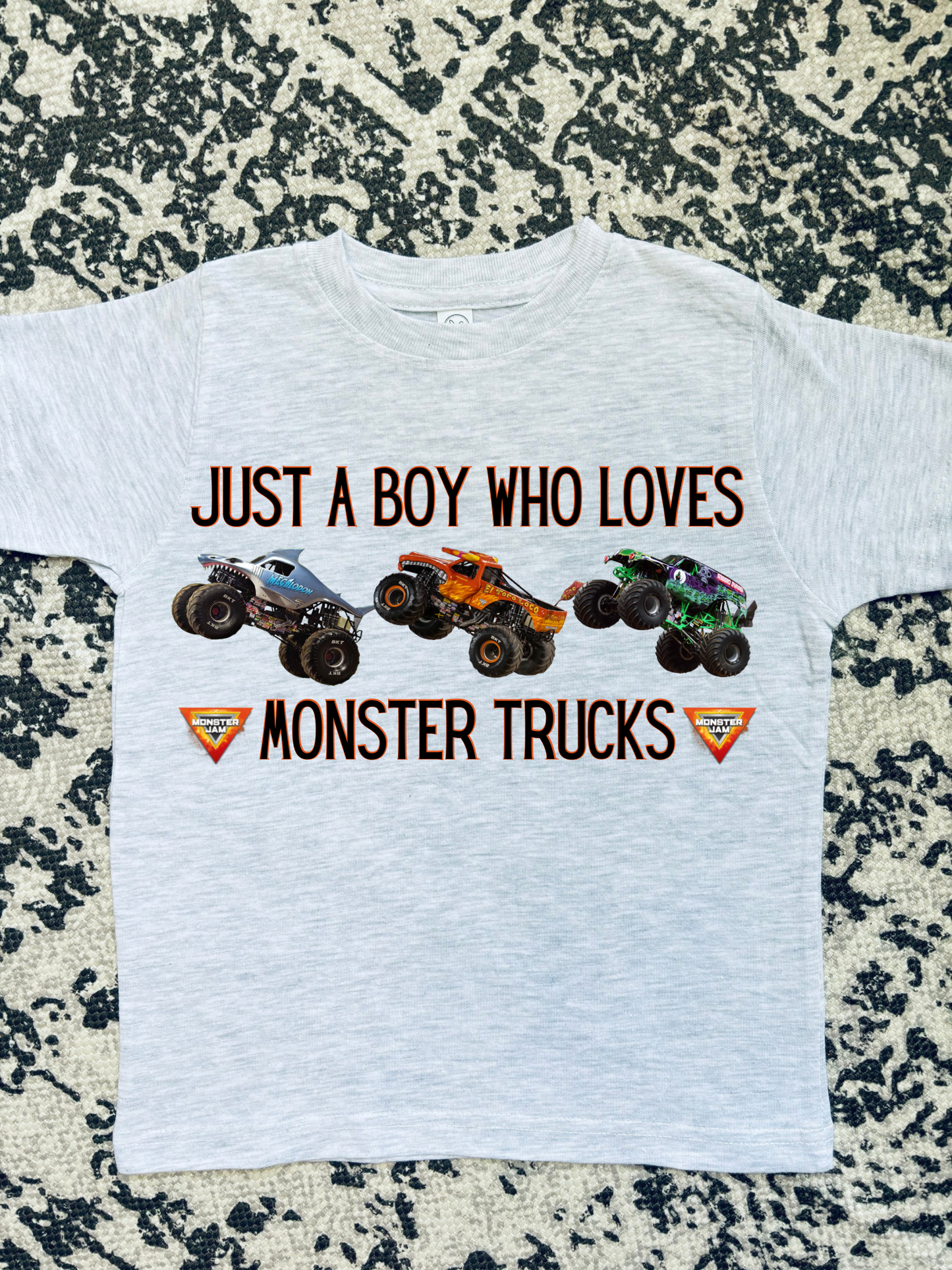 Just a boy who loves Monster Trucks 🧡